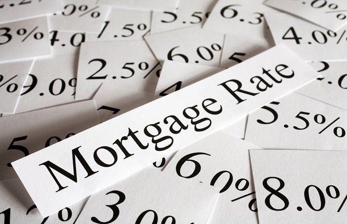 Image of a 'Mortgage Rates' sign with various interest rates, symbolizing the complexity of choosing the right rate for affordable homeownership